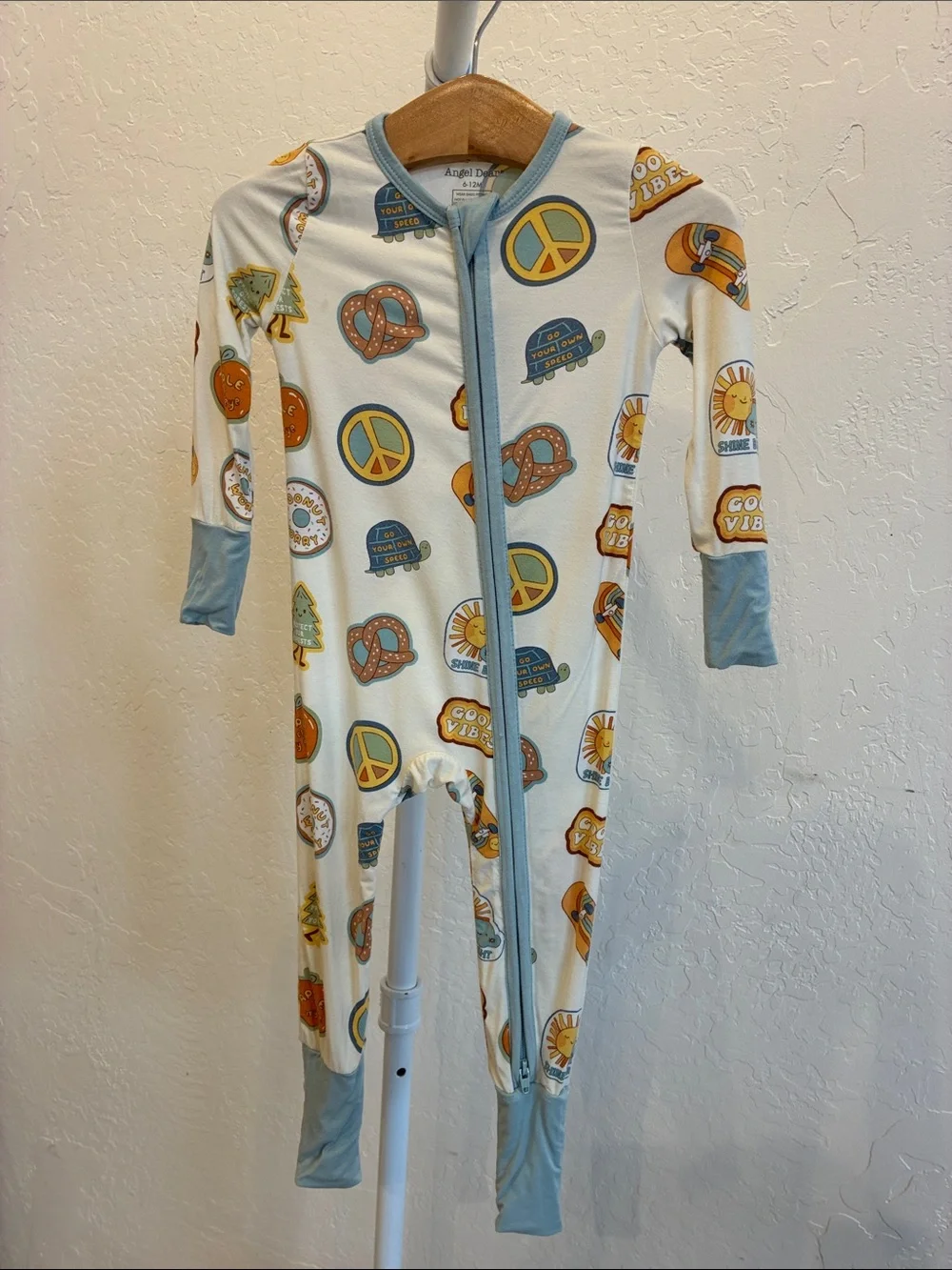 Angel Dear Cream One-Piece Footie Pajamas with Blue Trim and Yellow Accents